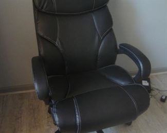 Leather office chair, new condition