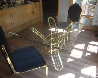 Glass top table with 4 chairs