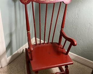 Small red rocking chair