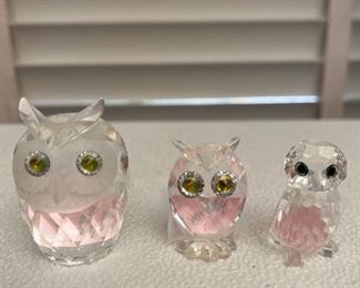 Swarovski owls (these are all clear glass with pink price tags on the backsides)