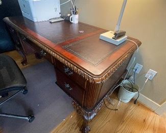 HOOKER Walnut desk with inlaid leather top