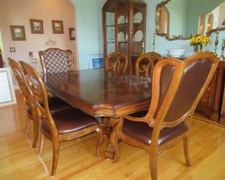 DINING ROOM SET FROM RI DESIGN CENTER TABLE IS 77 INCHES LONG WITH EXTRA LEAVES 4 FT ACROSS 31 INCHES HT