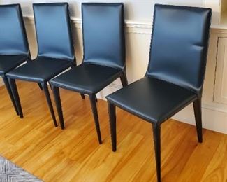 Set of four leather side chairs