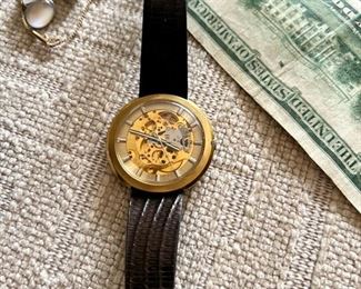 Vulcain 17 jewels, Swiss made M.S.R., T44. 
Skeleton / open works/ see-through watch.

Gender: Men's 
Display: Analog
Country of Manufacture: Switzerland
Winds great, keeps time. 
Patina on case.
The crystal on the face and back is in excellent condition with no scratches.