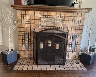 A Welcoming hearth with decorative accessories