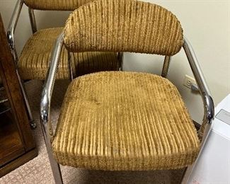 MCM chrome chairs on wheels