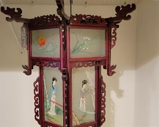 Large Oriental Reverse Painted 6 Paneled Hanging Lantern with carved Dragons and Birds.