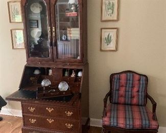 Thomasville drop-down secretary with lighted hutch and beveled glass. 7 ft. tall and 3' across with block feet (Chippendale revival) ,  Imi Ilheus  carved Brasil arm chair with plaid cushions