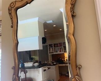 Gilt wood beveled mirror in the Hollywood Regency style 