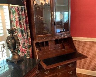 Thomasville drop-down secretary with lighted hutch and beveled glass. 7 t. tall and 3' across with block feet (Chippendale revival) 