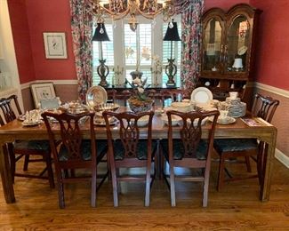 Drexel dining room table with two leaves surrounded by 8 Hickory Chippendale style chairs in mahogany- all excellent condition