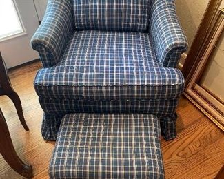 Plaid armchair with footrest