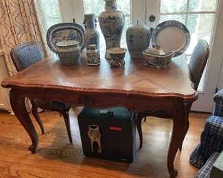 A lovely Country French draw-leaf table with parquetry top.