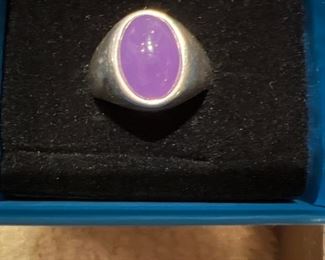 Sterling Silver ring with amethyst colored stones 