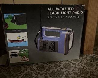 All weather flash light radio