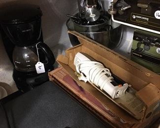 Carving knife, under counter toaster oven, mixer, coffee pot 