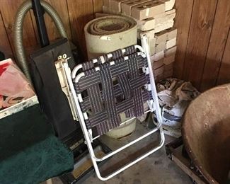 Brick, vacuum, lawn chair