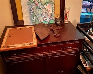 Cabinet and cool art.