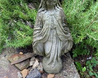 This statue seems distraught over the rock offerings. "Where's the bleeding Myrrh?"