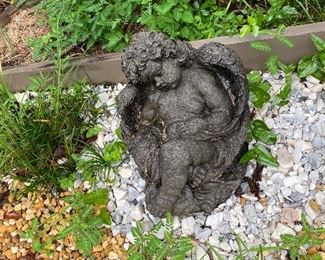 Cute angel with wasp nest underneath.