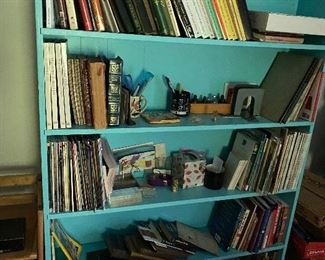 Cool shelf with even cooler books.