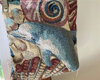 I thought I'd leave you with a photo of a happy dolphin purse. Because. Hope to see you at the sale! -Love, Joel