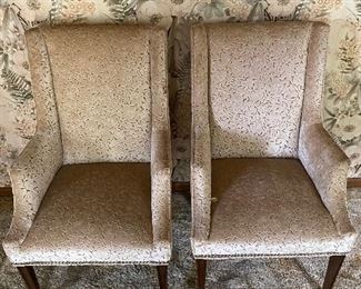 Pair of sitting chairs. Not to be confused with standing chairs I suppose.