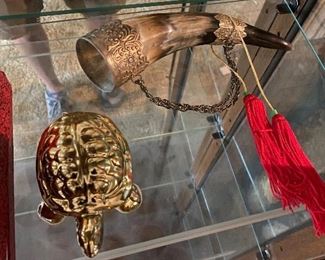 Horn of plenty with golden turtle.