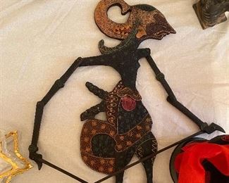 Some kind of wild wooden carved fighting doll.