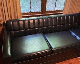 Coolest MCM pleather couch. Also a fold out bed, so if you want it bring along 3 of your friends to help you load it.