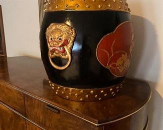 Cool container on even cooler dresser.