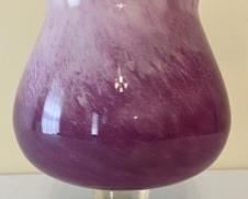 About 1-1/2 ft. tall, glazed swirl glass patters and clear crystal base