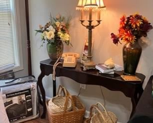 Baskets, lamps, vintage button telephone, side table also for sale, not just for display, vases w/ artificial floral