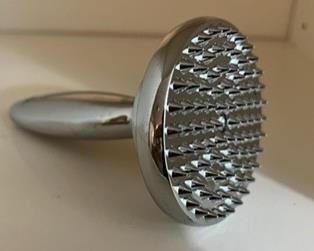 Pampered Chef stainless steel meat tenderizer (also handy as a weapon, it's so heavy). Never used. As either.