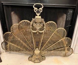 Solid brass peacock fireplace grate