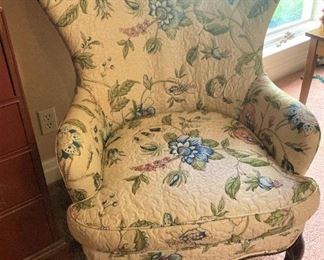 One of two upholstered chairs