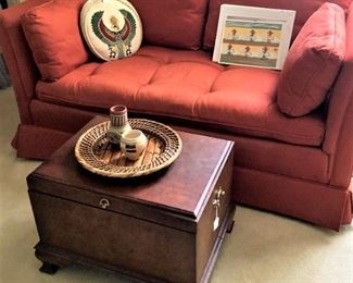 Orange loveseat; small storage chest perfect for a coffee table
