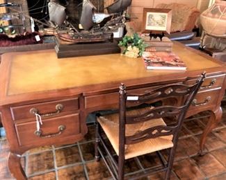 Handsome leather top 5-drawer desk; ladderback chair