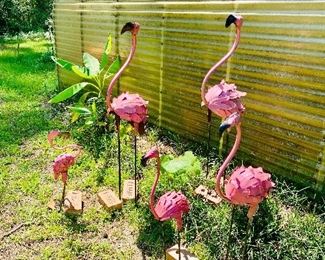 Metal yard art flamingos 