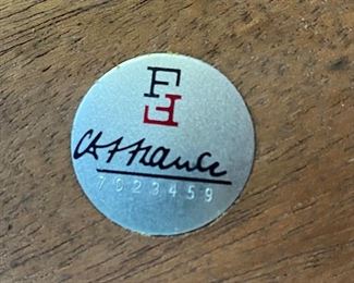 Furniture plate underneath the corner table in previous photo 