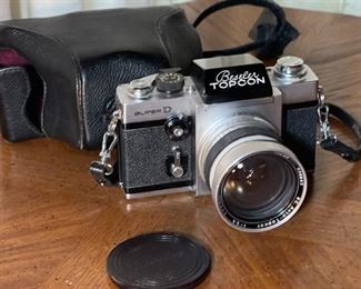 Beseler Topcon Super D 35mm SLR Camera Tokyo Kogaku R.E. Auto-Topcor 1:3.5 f2.5cm Lens 25mm f/3.5	4.25x6x4.75in	HxWxD
