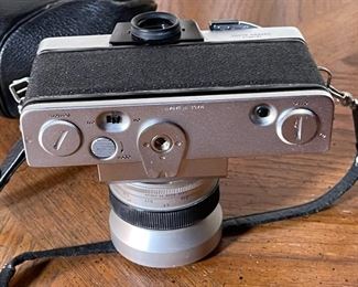 Beseler Topcon Super D 35mm SLR Camera Tokyo Kogaku R.E. Auto-Topcor 1:3.5 f2.5cm Lens 25mm f/3.5	4.25x6x4.75in	HxWxD
