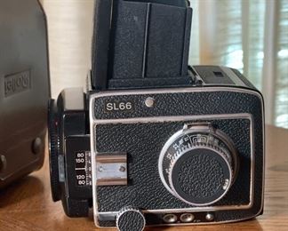 Rollei Rolleiflex SL66 Camera Body with Back & Case Medium Format SL-66	5x6x8in	HxWxD

