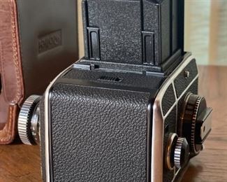 Rollei Rolleiflex SL66 Camera Body with Back & Case Medium Format SL-66	5x6x8in	HxWxD
