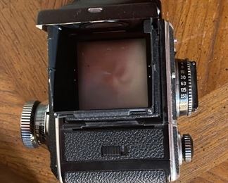 Rollei Rolleiflex SL66 Camera Body with Back & Case Medium Format SL-66	5x6x8in	HxWxD
