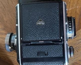 Rollei Rolleiflex SL66 Camera Body with Back & Case Medium Format SL-66	5x6x8in	HxWxD
