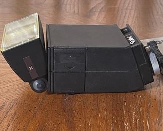 Rollei Rolleiflex Beta 5 Flash	2x3x6.5in	HxWxD
