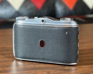 Vintage AGFA 120 Folding Camera AGNAR 85mm	3.5x5.25x4in	HxWxD
