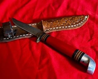 Vintage Western Boulder Red Delrin 7" Fixed Blade Fish/Bird Knife w/case	Knife total length 7 in blade length 3in.	
