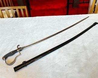 Vintage Military Officers Dress Sword	Blade length 34 in. Total length 39 .25 in	
